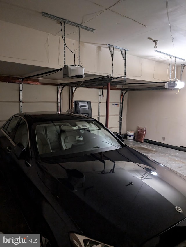 garage featuring a garage door opener