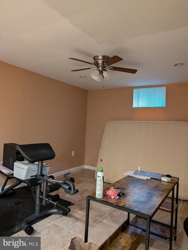 workout room featuring ceiling fan