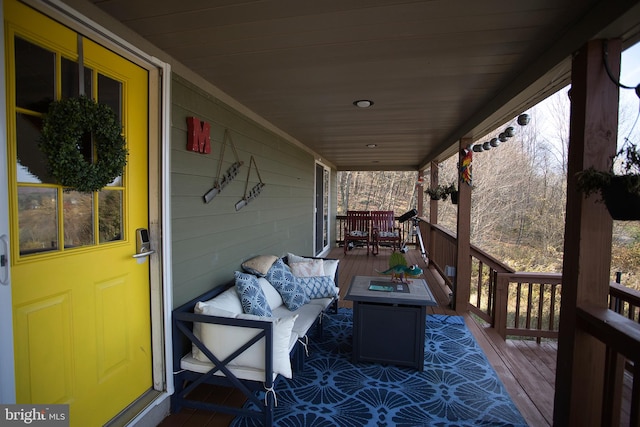 deck with an outdoor hangout area