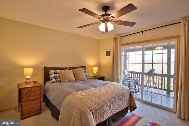 bedroom featuring access to outside, light colored carpet, and ceiling fan