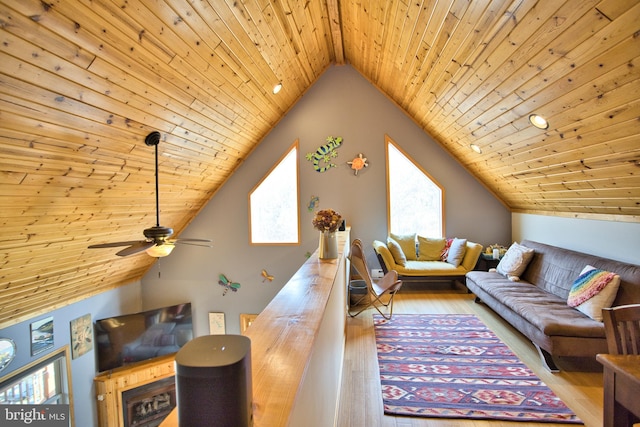 unfurnished living room with wooden ceiling, ceiling fan, light wood-type flooring, and high vaulted ceiling