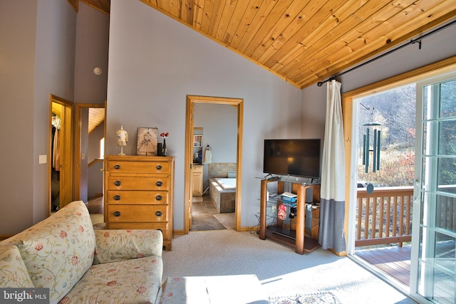 carpeted living room featuring high vaulted ceiling and wood ceiling