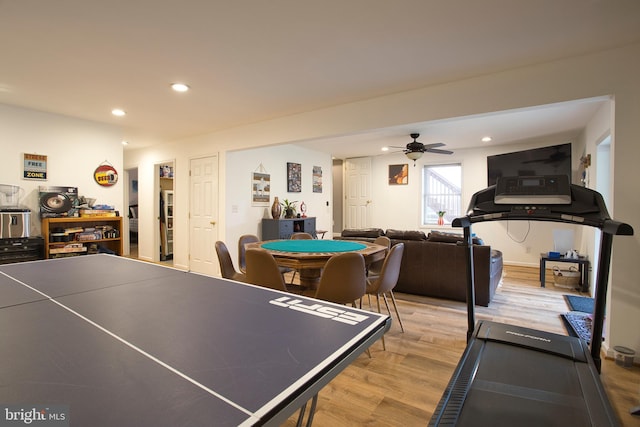 playroom featuring hardwood / wood-style flooring and ceiling fan