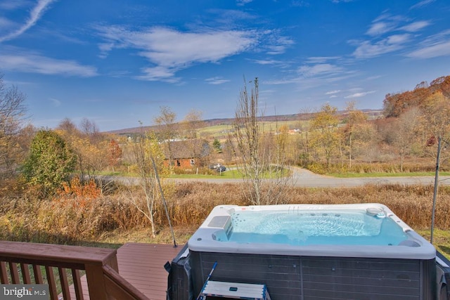 exterior space featuring a hot tub