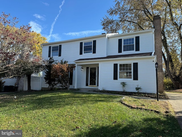 view of front property featuring a front lawn