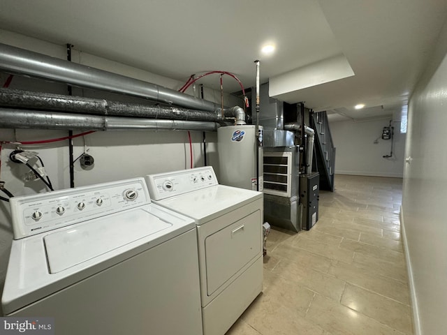 laundry area featuring separate washer and dryer and gas water heater