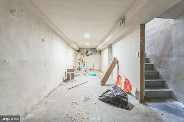 basement featuring water heater