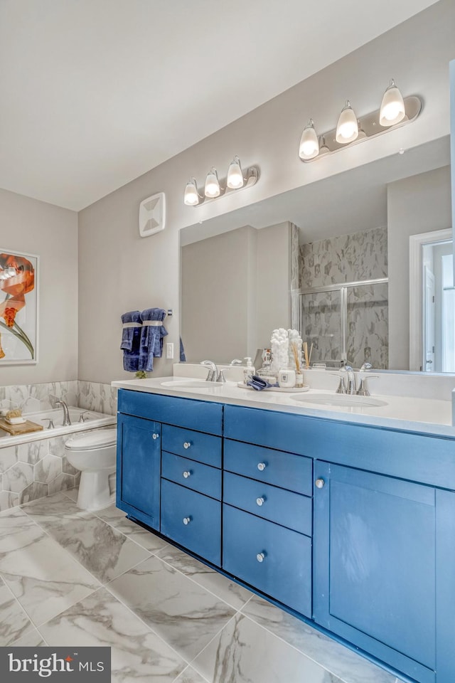 full bathroom featuring shower with separate bathtub, toilet, and vanity