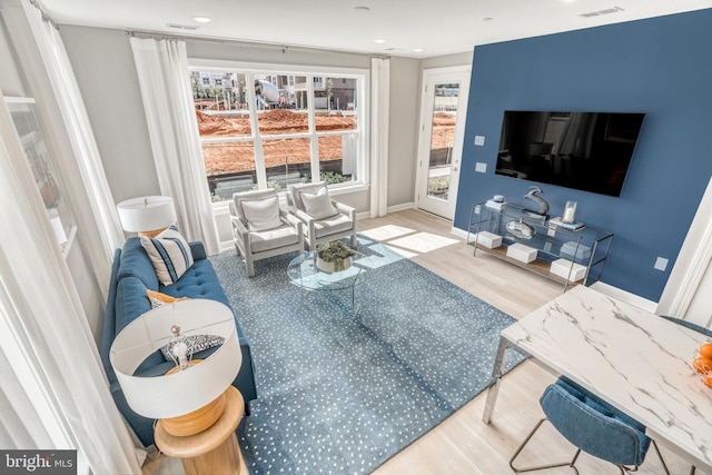 living room featuring light hardwood / wood-style floors