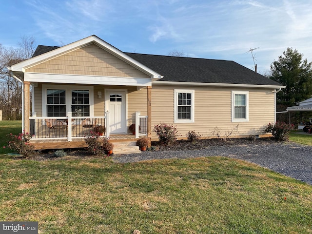 view of front of house with a porch and a front lawn