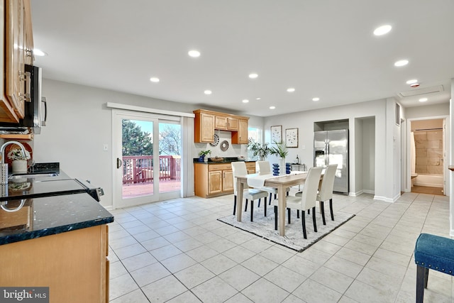 dining room featuring light tile patterned flooring