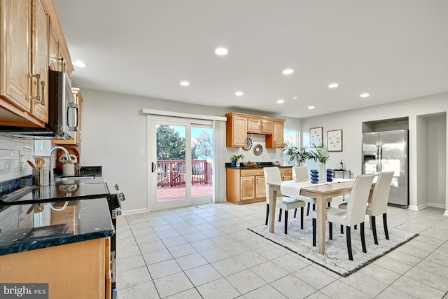 view of tiled dining space