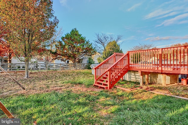 view of yard featuring a wooden deck