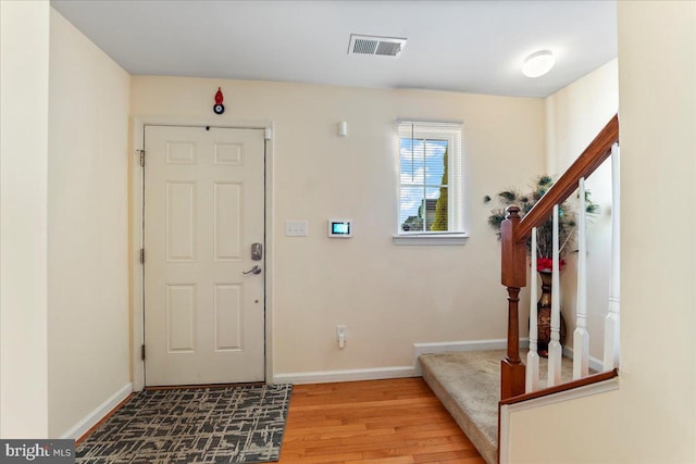 foyer entrance featuring light hardwood / wood-style floors