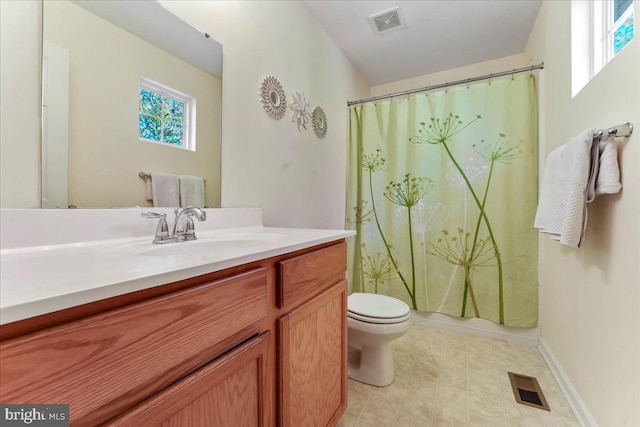 full bathroom with toilet, vanity, and shower / bathtub combination with curtain