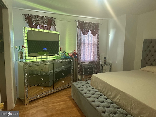 bedroom featuring hardwood / wood-style floors