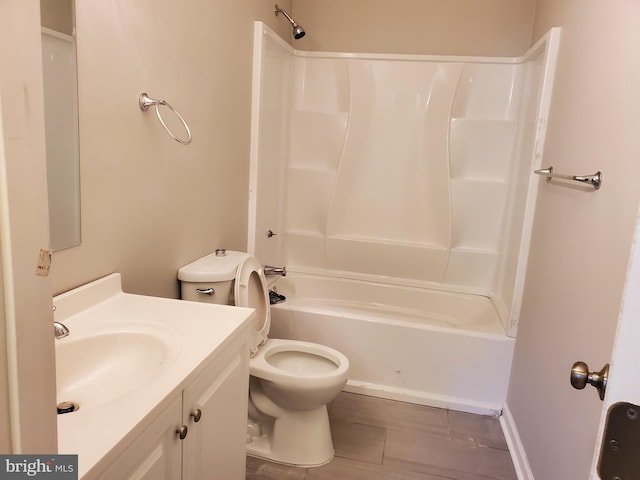 full bathroom with vanity, toilet, and bathtub / shower combination