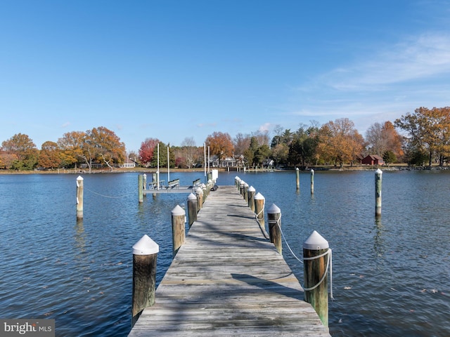 view of dock with a water view