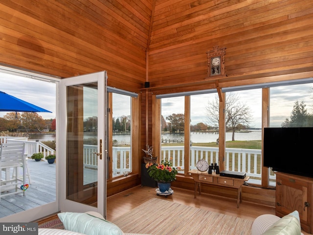 sunroom with a water view