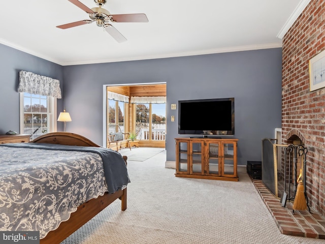 bedroom with carpet floors, multiple windows, ornamental molding, and ceiling fan