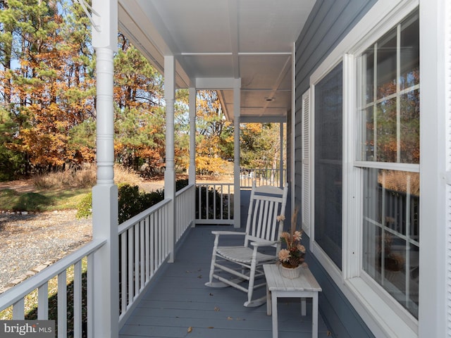 wooden deck featuring a porch