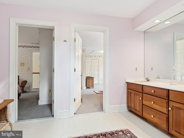 bathroom featuring tile patterned floors and vanity