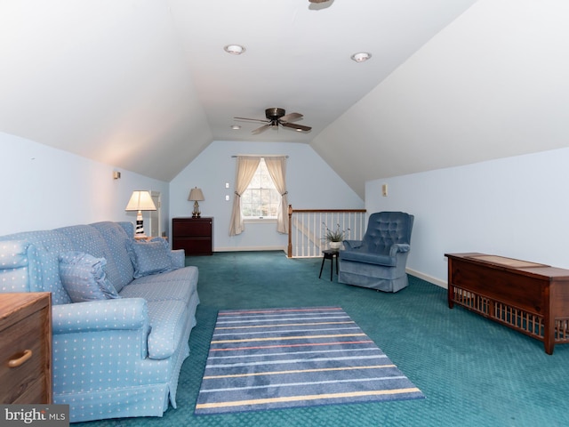 carpeted living room with ceiling fan and lofted ceiling