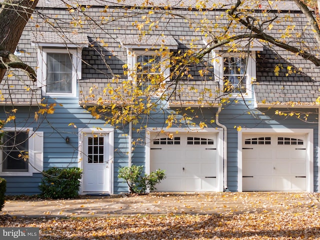 view of front of property with a garage