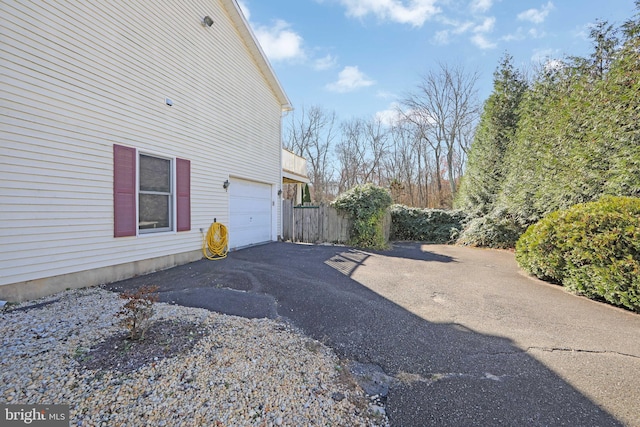 view of home's exterior featuring a garage