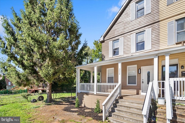 view of front of home featuring covered porch