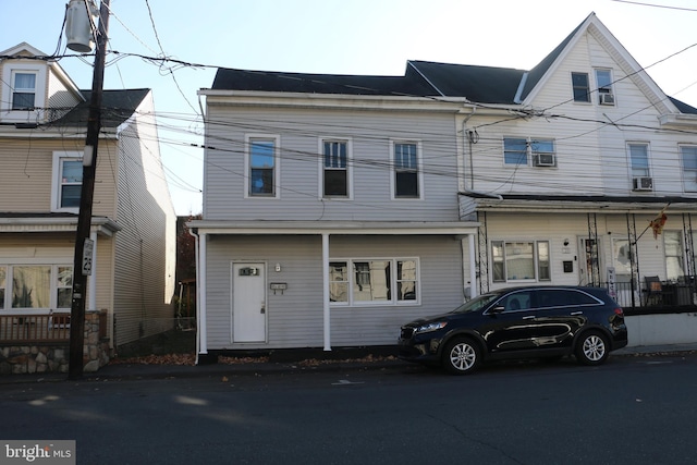 view of property with a porch