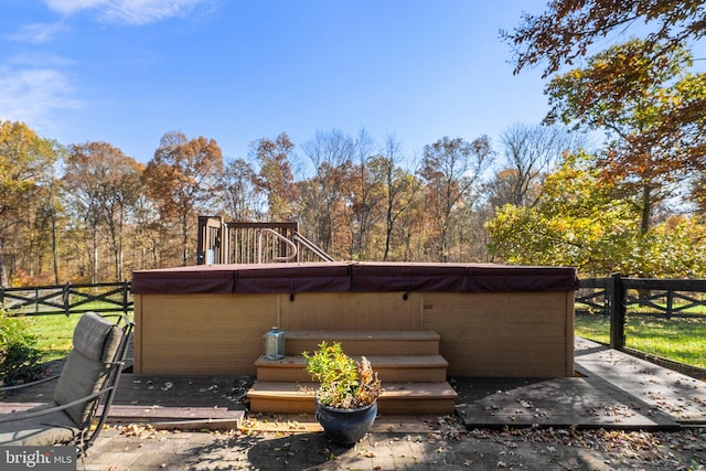 exterior space featuring a hot tub