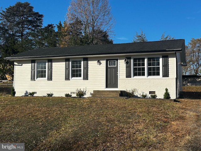 view of front of home with a front yard