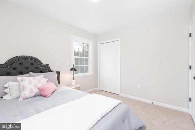 bedroom with light colored carpet