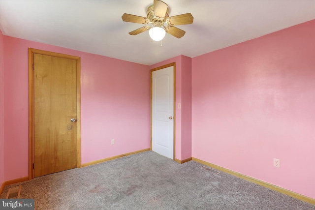 unfurnished bedroom featuring ceiling fan, a closet, and carpet