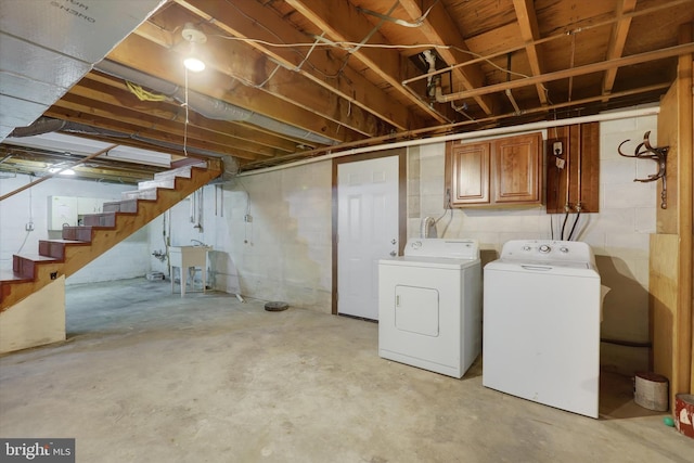 basement featuring washing machine and dryer