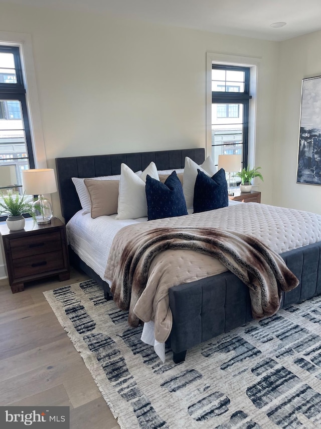 bedroom featuring hardwood / wood-style floors