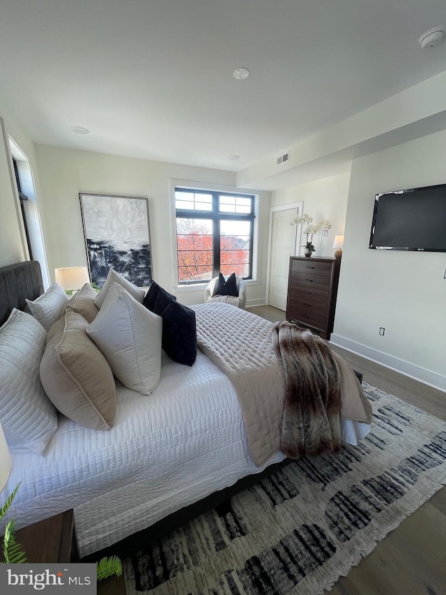 bedroom featuring hardwood / wood-style floors