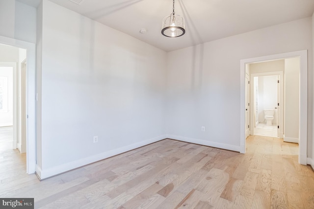 unfurnished room featuring light wood-type flooring