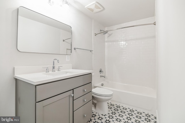 full bathroom featuring vanity, shower / washtub combination, and toilet