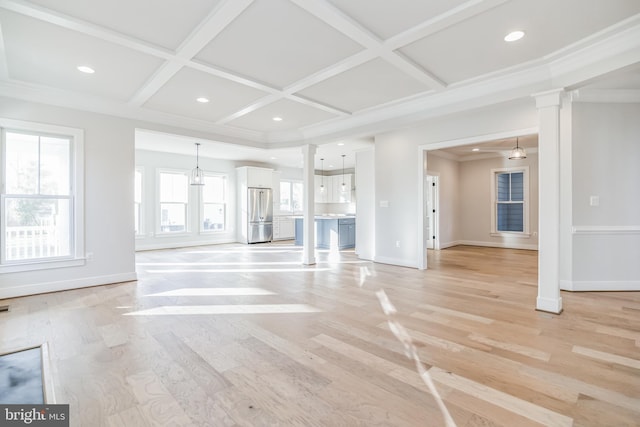 unfurnished living room with light wood-type flooring, coffered ceiling, crown molding, and decorative columns