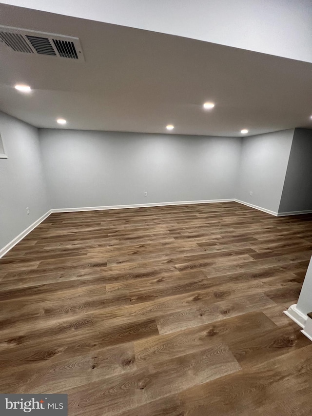 basement featuring dark wood-type flooring