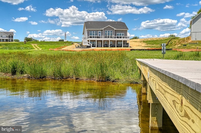 view of dock with a water view