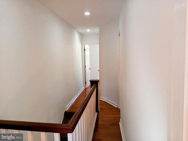 hallway featuring dark wood-type flooring