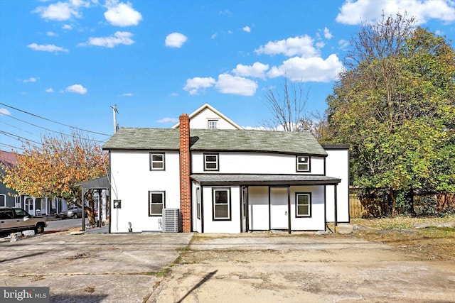 view of front of home featuring cooling unit