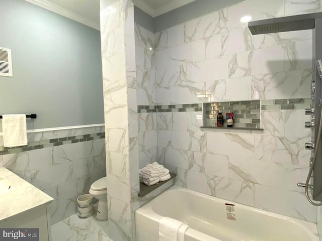 full bathroom with vanity, tiled shower / bath combo, crown molding, tile walls, and toilet