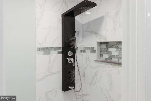 details with a tile shower