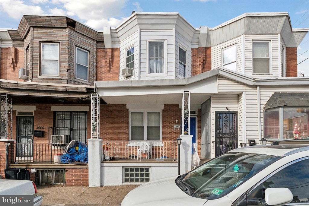 multi unit property featuring covered porch