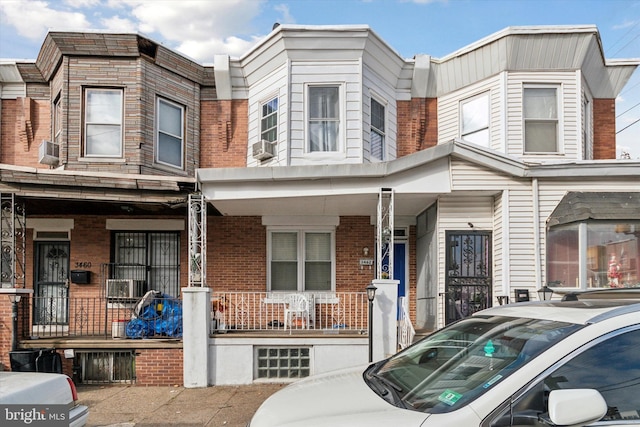 multi unit property featuring covered porch