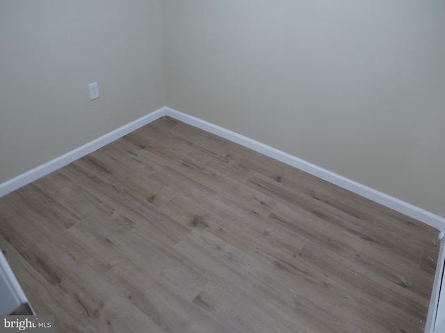 unfurnished room featuring light hardwood / wood-style floors